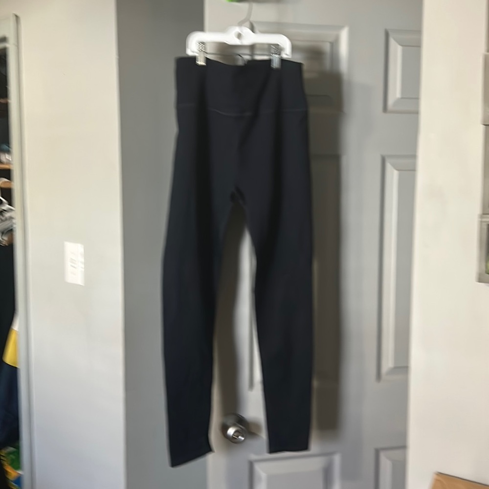 Navy blue ribbed stretch workout leggings with tie back from Fabletics